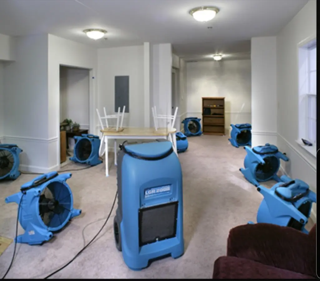 Air movers and dehumidifier setup for Water Damage Restoration in Buckhall